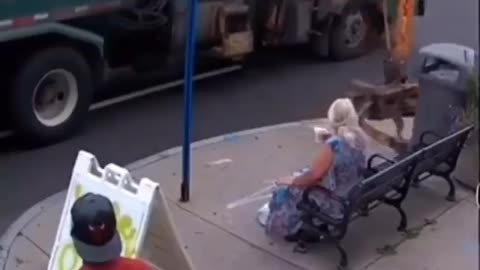Rochester NY garbage truck picking up city trash can pulls bus stop and woman