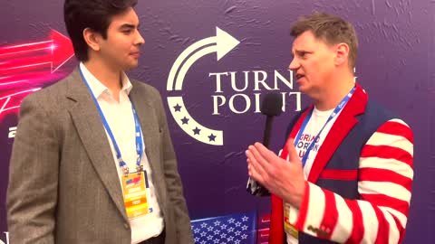 John Paul speaking with Jordan Conradson from The Gateway Pundit, at AmericaFest 2021