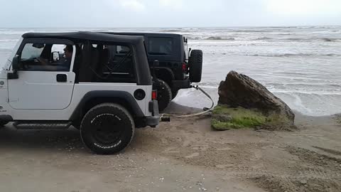 Jeep Gets Rear-Ended By Stubborn Rock