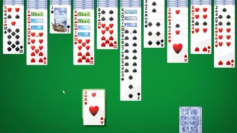 Busy at work...playing solitaire.