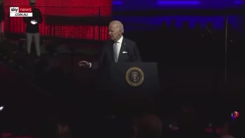 Biden: 'God bless you all, Democracy'.. then turns to shake the hand of.... no one!