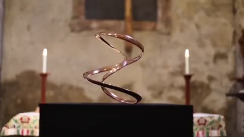 The mesmerizing kinetic sculpture known as "Wonder" created by artist Tom Lawton.