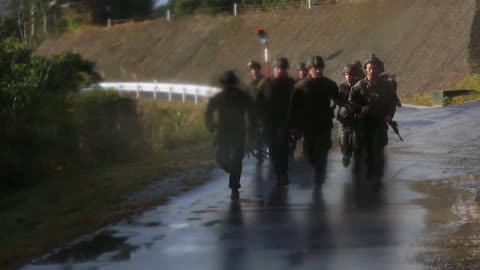 US Marines attached to the 4th Marine Regiment participate in a 5km timed movement.