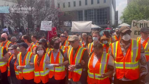 Columbia faculty create a human wall to prevent the Gaza encampment from being taken down.