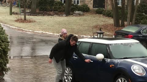 Teamwork Helps Navigate Super Slippery Driveway