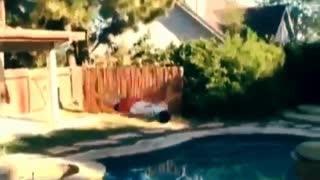 Guy jumps from roof of house blly flop into pool