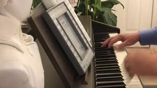 "I Know Who Holds Tomorrow" -- Kendall Straight on the piano