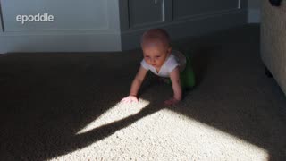Confused Baby Is Startled By The Lurking Shadow On The Floor