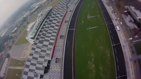 NASCAR driver Brian Vickers sky dives into Daytona speedway