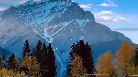 blue sky, snow-white mountains