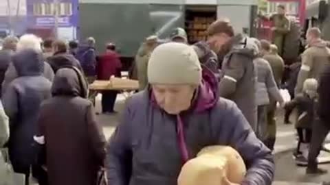 Russian troops distribute Easter bread in Mariupol