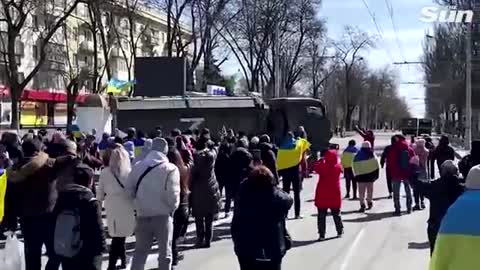 "Go home!" - Protesters confront Russian military vehicles in Ukrainian city of Kherson