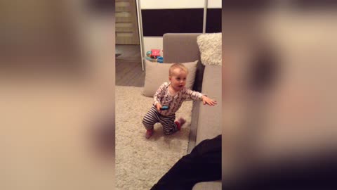 ADORABLE BABY Pretends Talking to Grandma on iPhone