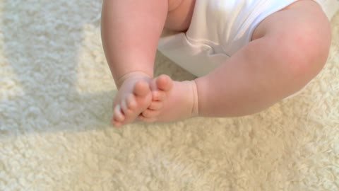 Baby Feet Kicking Slow Motion Slow motion clip of a baby kicking its feet.