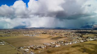 Stunning hyperlapse of snow clouds set against the mountains