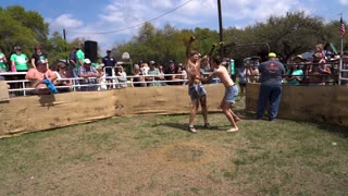 Pigs getting dragged out and assaulted by a couple topless guys in short shorts