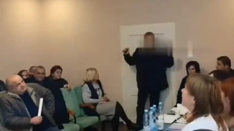Village council leader in Ukraine detonates grenades inside meeting