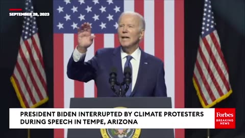 Climate change activists interrupt President Biden's speech in Tempe, Arizona.