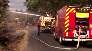 French firefighters in good spirits despite fatigue