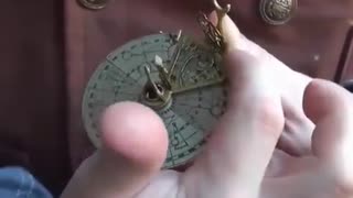 AN ELABORATE PORTABLE AND FOLDABLE 19TH CENTURY NECKLACE SUNDIAL