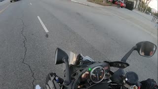 Motorcycle Accident on Busy Road