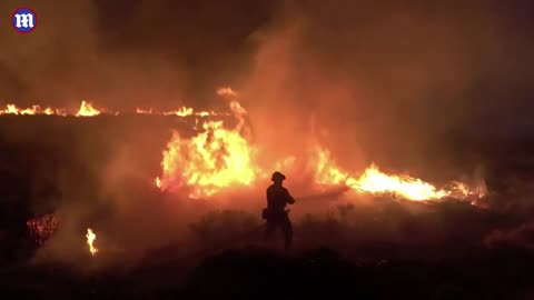 Firefighter Battle Against Tenerife Wildfires Amid Mass Civilian Evacuation