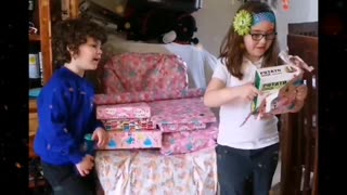 April 2017 Gabrielle unwrapping gifts at daddy's part 1