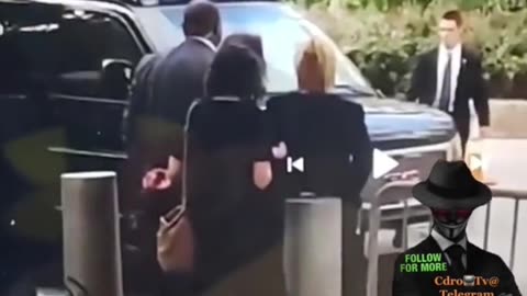 Hillary in cuffs