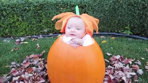 Baby dressed as a Pumpkin... Very Cute