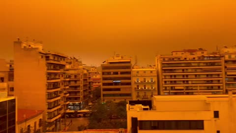 Saharan dust turning the sky of Athens, Greece completely orange