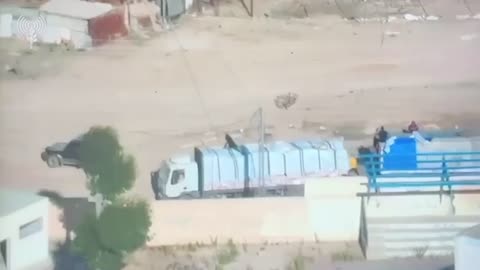 Armed Hamas terrorists try to take over a humanitarian truck in Rafah.
