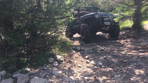 Jeeps climbing rock outcrop Tuttle ORV