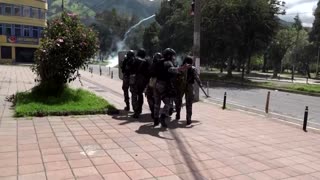 Indigenous protesters face off with police in Ecuador