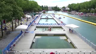 Locals, tourists bask in sun at Paris 'beaches'