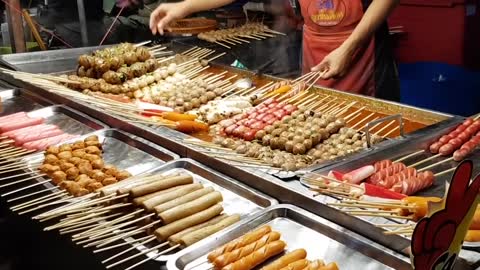 All kinds of delicious skewers in Thai street food