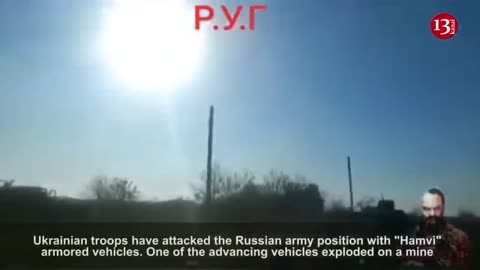 Ukrainian fighters have a narrow escape after their armored vehicle is hit by a mine during attack