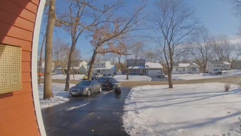 OOPS! A man’s icy driveway gets the best of him when he tries to park his wife’s car. Take a look.