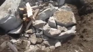 Fire-setting to break boulders