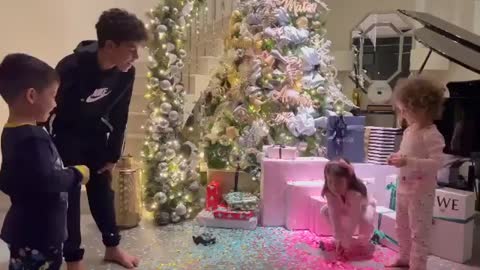 Cristiano Ronaldo children playing with their Christmas tree