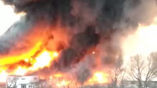 Firefighters battling a massive blaze at a cattle barn in Rock Island, Illinois