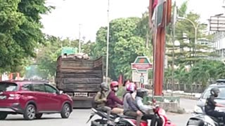 The action of the container truck driver is astounding, fast turning around in a narrow area