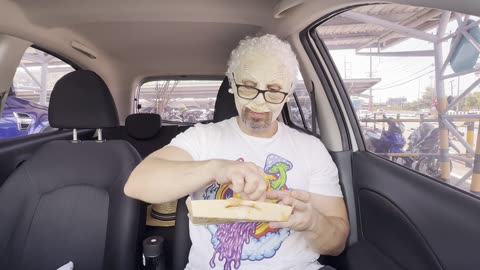 Granny Goatee reviews Auntie Anne's Philly Cheesesteak BBQ Beef Sausage Pretzel in Phuket, Thailand!