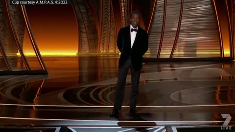 Watch the uncensored moment Will Smith smacks Chris Rock on stage at the Oscars, drops F-bomb