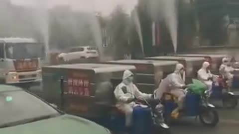 China Sprays Chem Trails Right in Public
