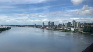 Crossing the Fraser river aboard the Vancouver skytrain Canada