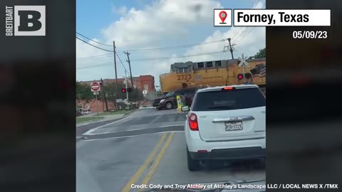 WHOAH! Three People Barely Escape Before TRAIN SMASHES CAR Stuck on Tracks