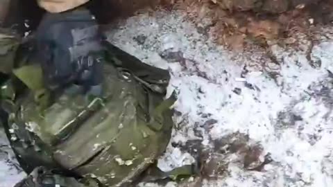 Ukrainians Searching the Gear of a Mercenary from Kazakhstan Who's Been in Ukraine Less the 10 days.