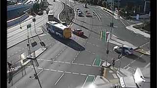 Motorcycle narrowly misses pedestrians following crash