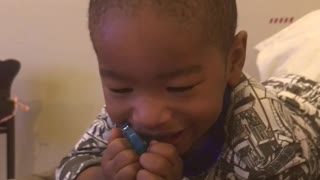 Baby finds himself funny