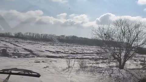 Russian military column passes by several destroyed Ukrainian tanks, APCs in the Kharkov oblast